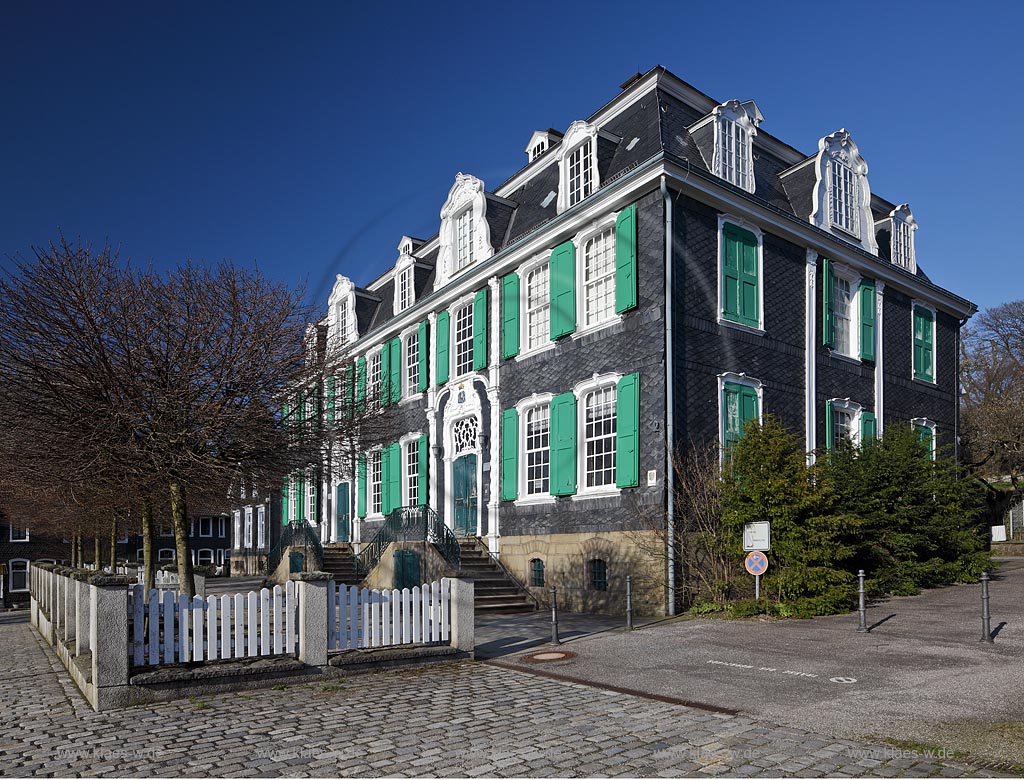 Remscheid-Hasten Haus Cleff, ein Patrizierhaus aus dem Rokoko. Die Gebrueder Hilger  lieen es in selbigem Stil 1778/79 erbauen. In den Jahren von 1811 bis 1814 diente es als Wohnhaus des Fabrikanten und Buergermeisters Georg Heinrich Sonntag auch als Rathaus von Remscheid. Der zweigeschossige verschieferte Fachwerkbau mit Mansarddach gehoert heute zum Historischem Zentrum der Stadt Remscheid und beherbergt das Museum Haus Cleff; Remscheid Hasten histrical house Cleff from rokoko style