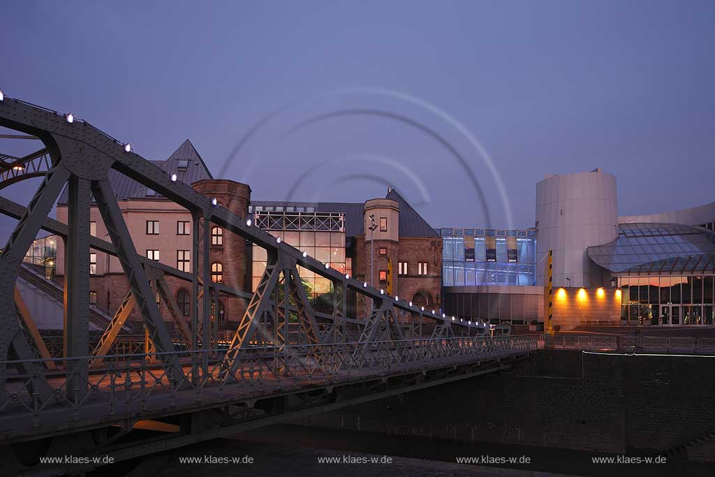 Koeln Altstadt Sued, Rheinauhafen Schokoladenmuseum im Abenlicht zur blauen Stunde illuminiert; Cologne old town south chocolate museum during blue hour illuminated