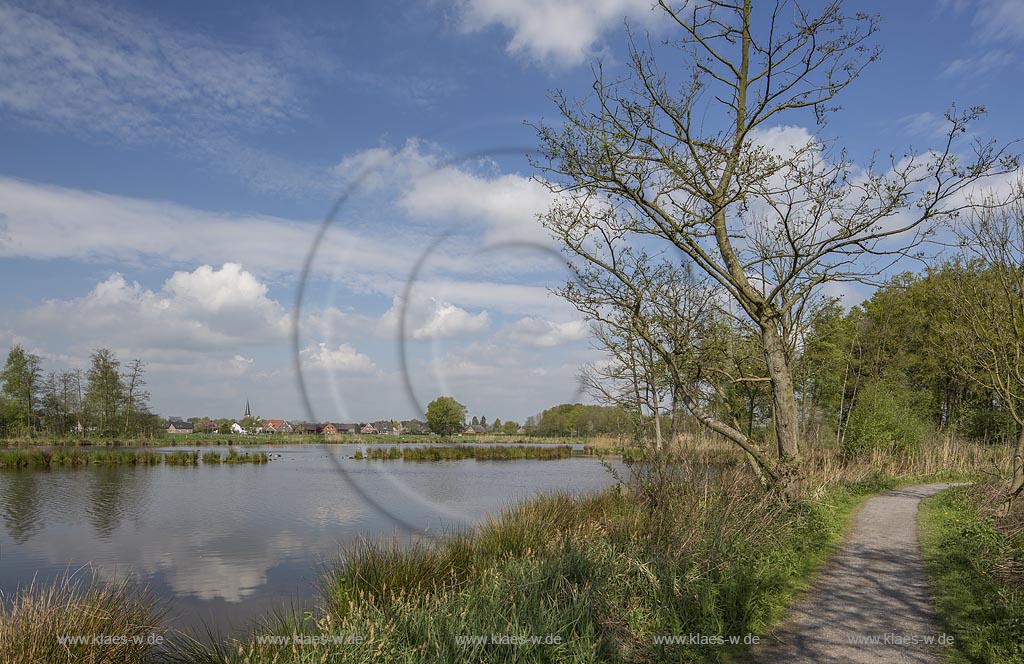 Nettetal, Naturpark Schwalm-Nette,  Grosser De-Witt-See, im Hintergrund der Ort Leuth im Fruehling mit Wolkenstimmung; Nettetal, lake Grosser De-Witt-See with village Leuth in the background.